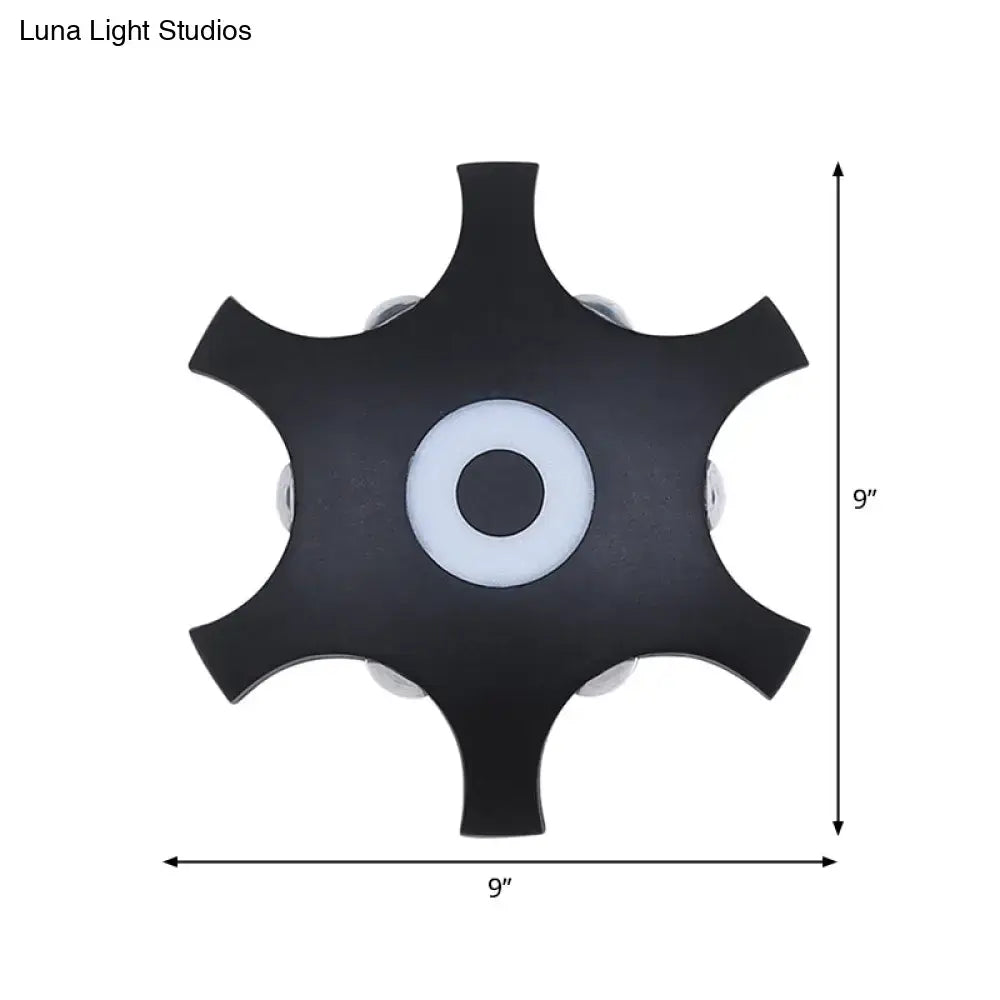Star LED Wall Light black star-shaped metal wall sconce with central halo ring on Tampa Home & Garden Store