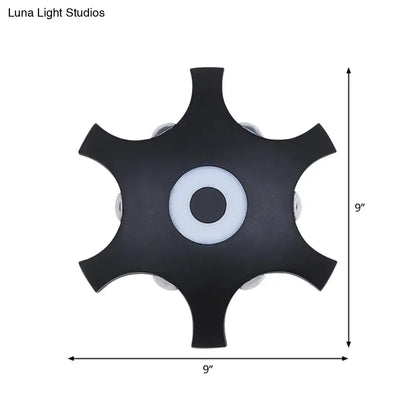 Star LED Wall Light black star-shaped metal wall sconce with central halo ring on Tampa Home & Garden Store