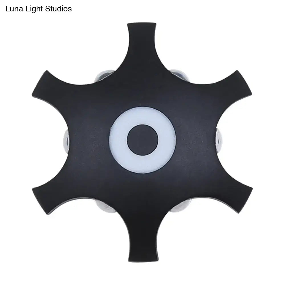 Star LED Wall Light by Decorbites, black six-point star wall sconce with central LED ring on Tampa Home & Garden Store
