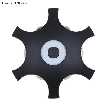 Star LED Wall Light by Decorbites, black six-point star wall sconce with central LED ring on Tampa Home & Garden Store