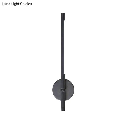 Decorbites metal tubular wall sconce with round wall plate in dark matte finish on Tampa Home & Garden Store