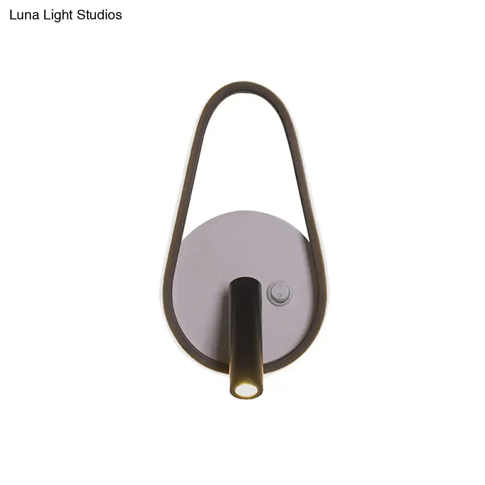 Warm Light Wall Sconce by Decorbites, teardrop metal frame with downward cylindrical light on Tampa Home & Garden Store
