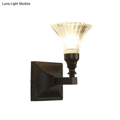 Black Flare Flush Sconce by Decorbites with black metal backplate and flared glass shade on Tampa Home & Garden Store