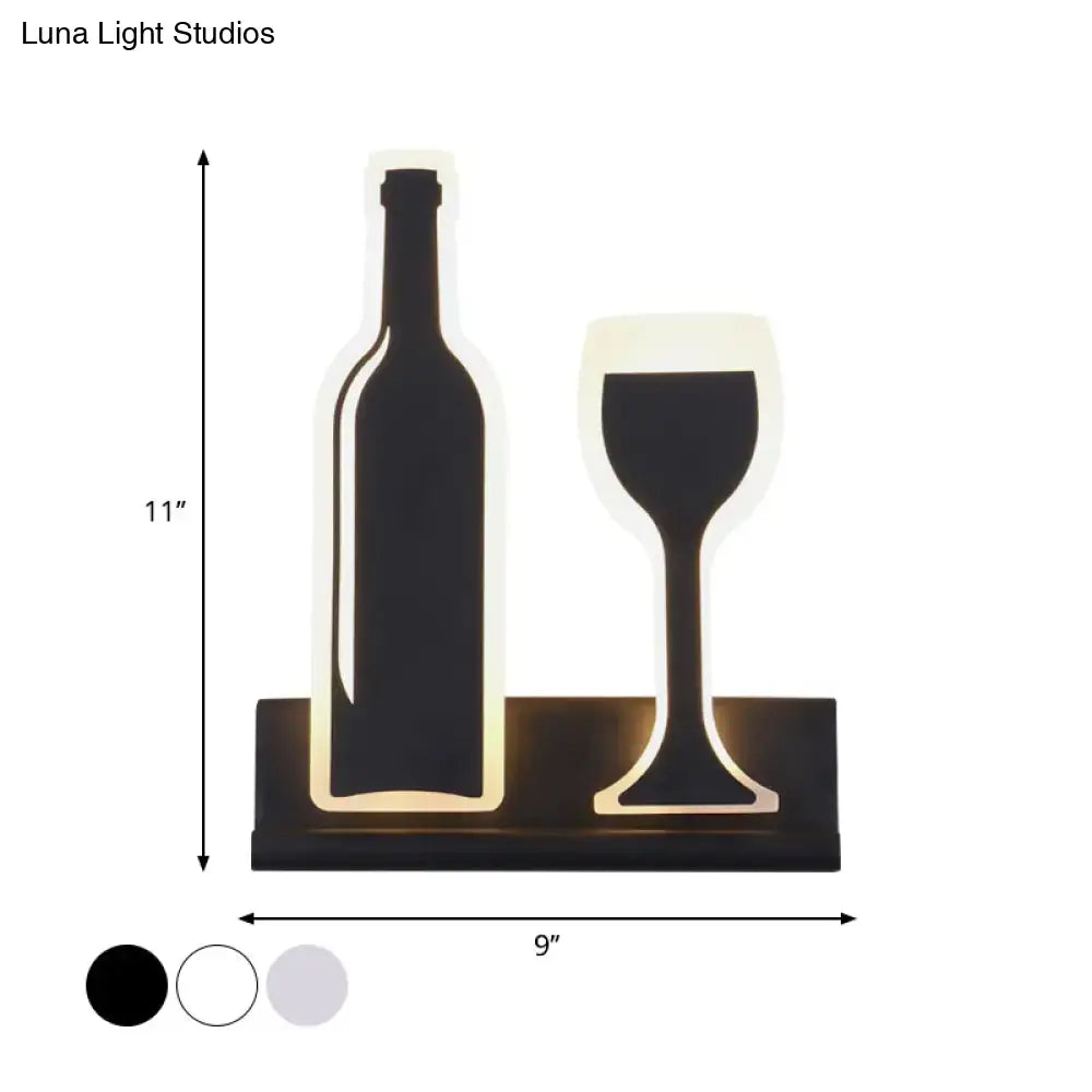 Black cast iron industrial sconce with wine bottle and goblet silhouette by Decorbites on Tampa Home & Garden Store