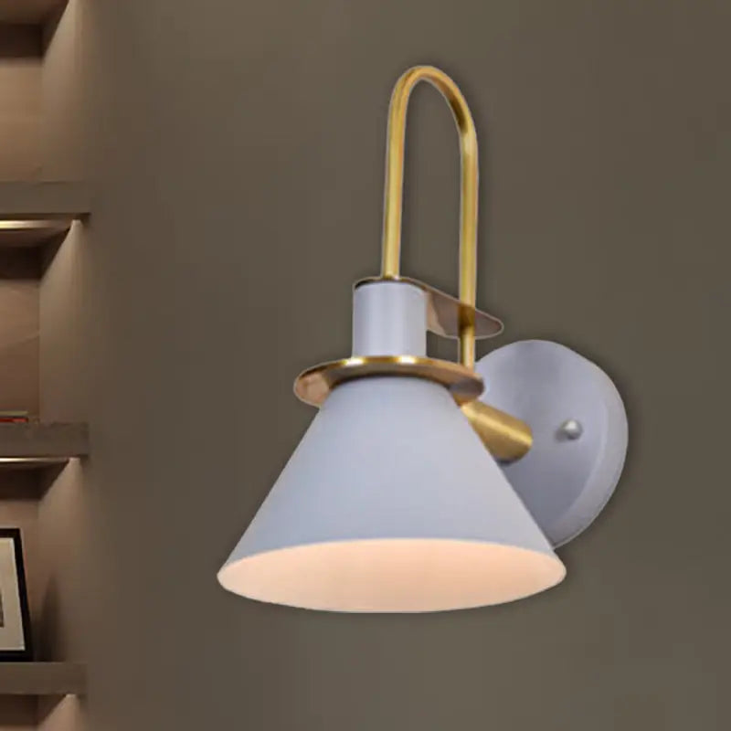 Brass pyramid wall sconce by Decorbites with white frosted glass shade on Tampa Home & Garden Store