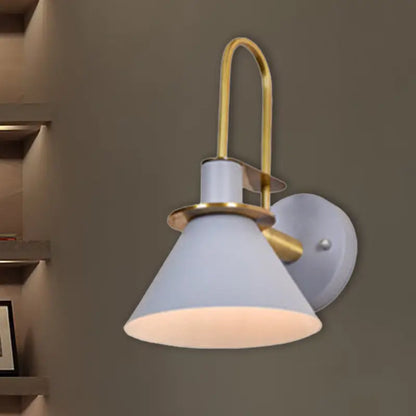 Brass pyramid wall sconce by Decorbites with white frosted glass shade on Tampa Home & Garden Store