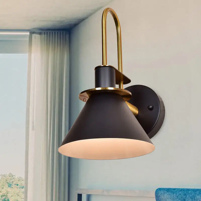 Decorbites Brass Pyramid Wall Sconce with black shade and gold arched mount on Tampa Home & Garden Store