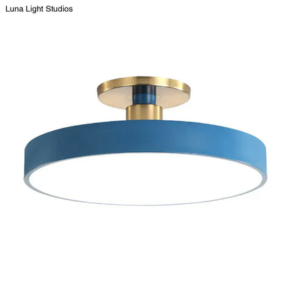 Modern blue and gold round flush mount ceiling light with white diffuser for bedroom on Tampa Home & Garden Store