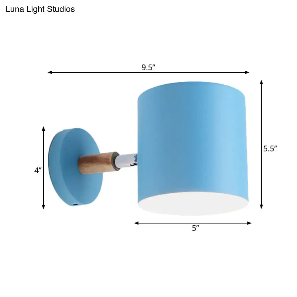 Blue tubular wall sconce by Decorbites with wooden mount and cylindrical shade on Tampa Home & Garden Store
