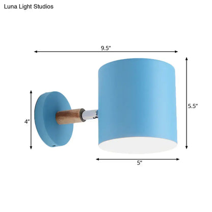 Blue tubular wall sconce by Decorbites with wooden mount and cylindrical shade on Tampa Home & Garden Store