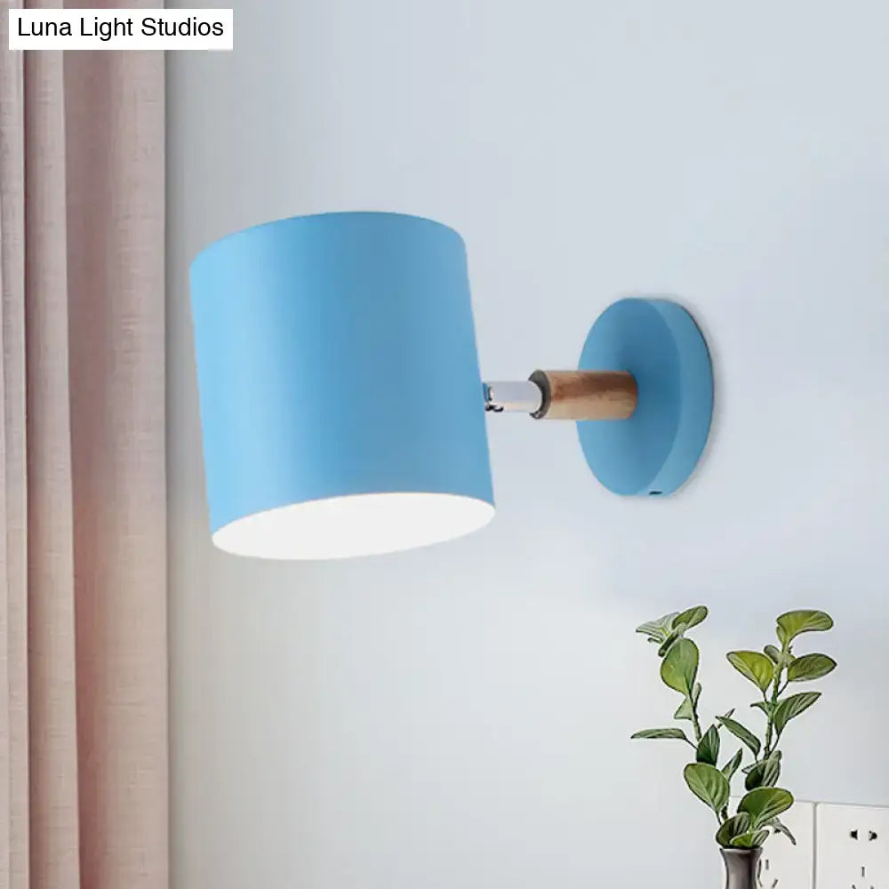Blue tubular wall sconce with wood arm and round backplate Decorbites on Tampa Home & Garden Store