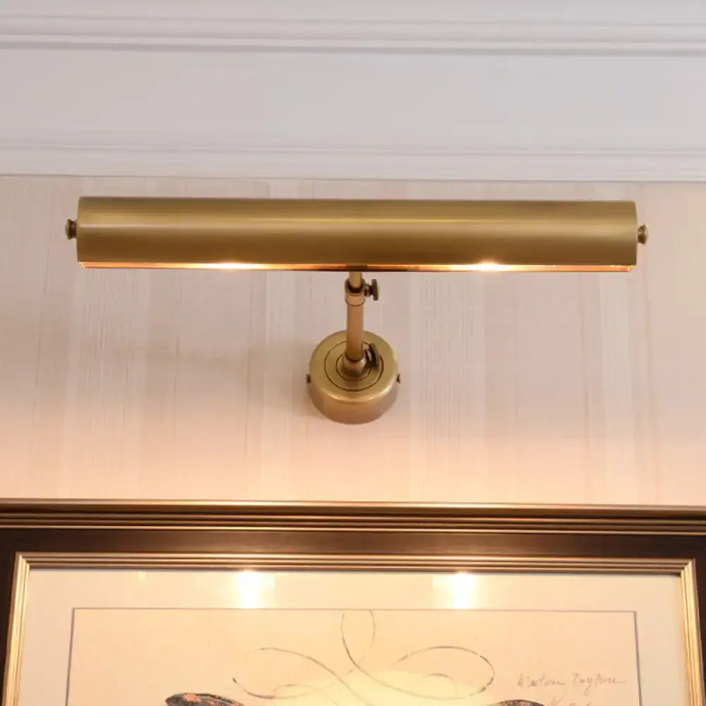 Brass adjustable vanity sconce with cylindrical bar, wall mount on Tampa Home & Garden Store