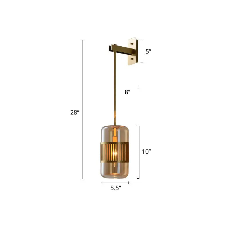 Amber glass cylindrical sconce with brass mount and ribbed metal band, wall-mounted light on Tampa Home & Garden Store