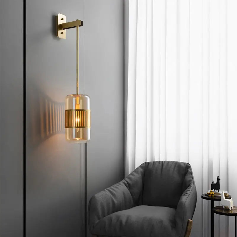 Amber glass cylindrical sconce with brass mount warm glow Decorbites on Tampa Home & Garden Store