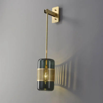 Decorbites amber glass cylindrical blackish green wall sconce with brass mount on Tampa Home & Garden Store
