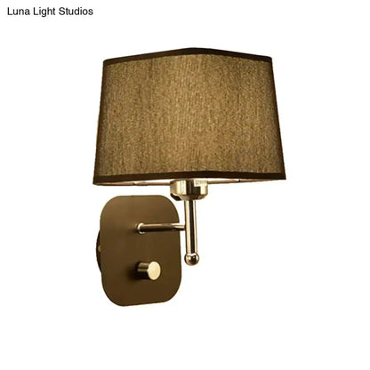 Modern brass wall sconce with beige linen shade by Decorbites on Tampa Home & Garden Store
