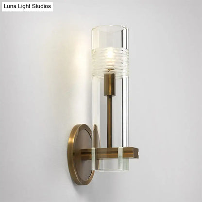Brass Glass Tubular Sconce with clear glass tube and circular brass backplate Decorbites on Tampa Home & Garden Store