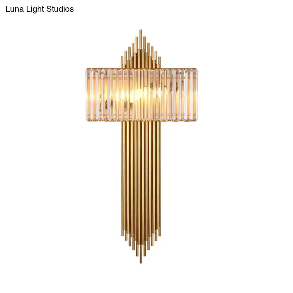 Modern brass and crystal rectangular wall sconce with vertical gold rods and crystal shade on Tampa Home & Garden Store