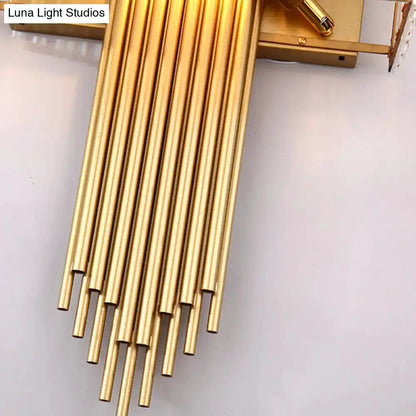 Modern brass wall light with vertical gold rods in a rectangular design for bedroom Decorbites on Tampa Home & Garden Store