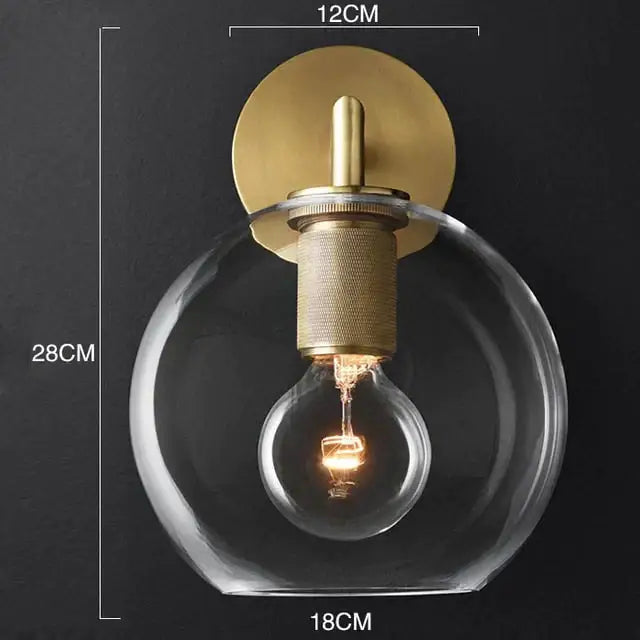 Brass glass wall sconce with clear globe and vintage Edison bulb by Decorbites on Tampa Home & Garden Store