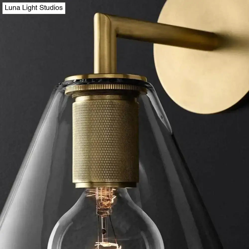 Brass Glass Wall Lamp wall sconce with clear glass shade and Edison bulb on brass backplate on Tampa Home & Garden Store