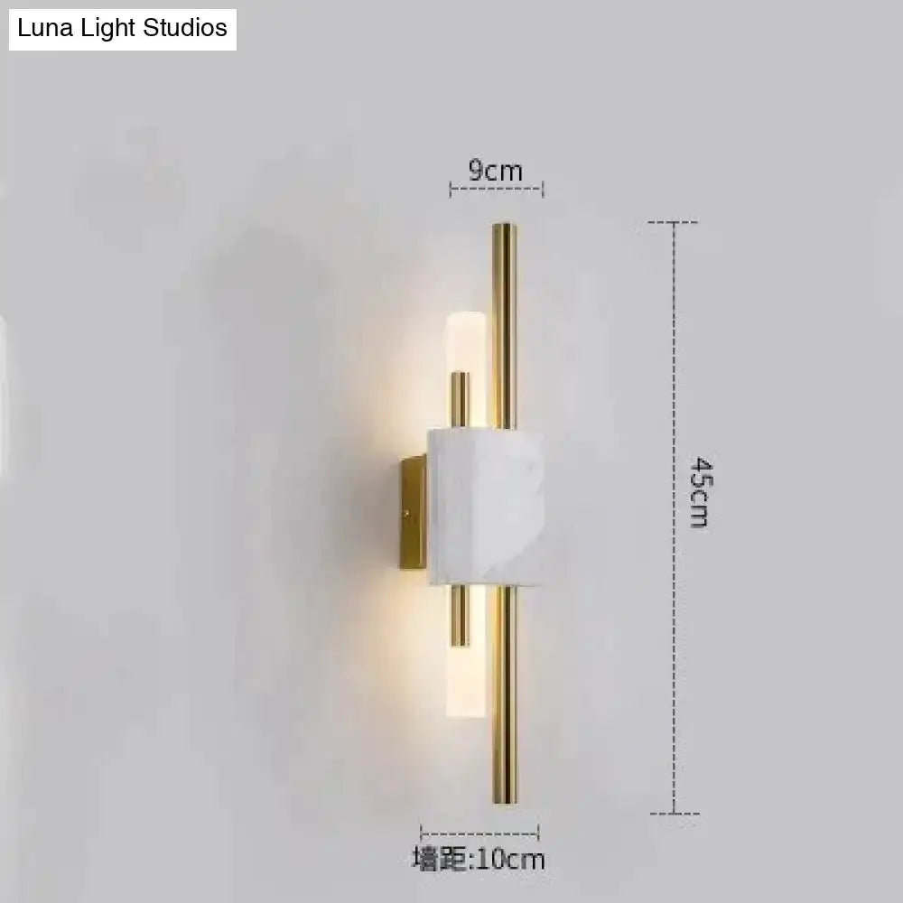 Brass and marble LED wall light with marble block and vertical brass rods, 45 cm tall on Tampa Home & Garden Store