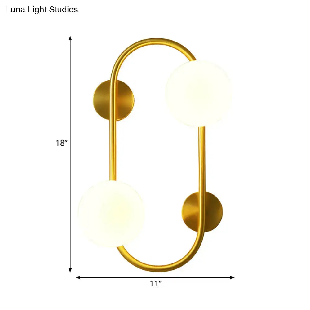 Milk Glass LED Sconce by Decorbites; brass arc frame with 2 frosted globes, 18in tall x 11in wide on Tampa Home & Garden Store