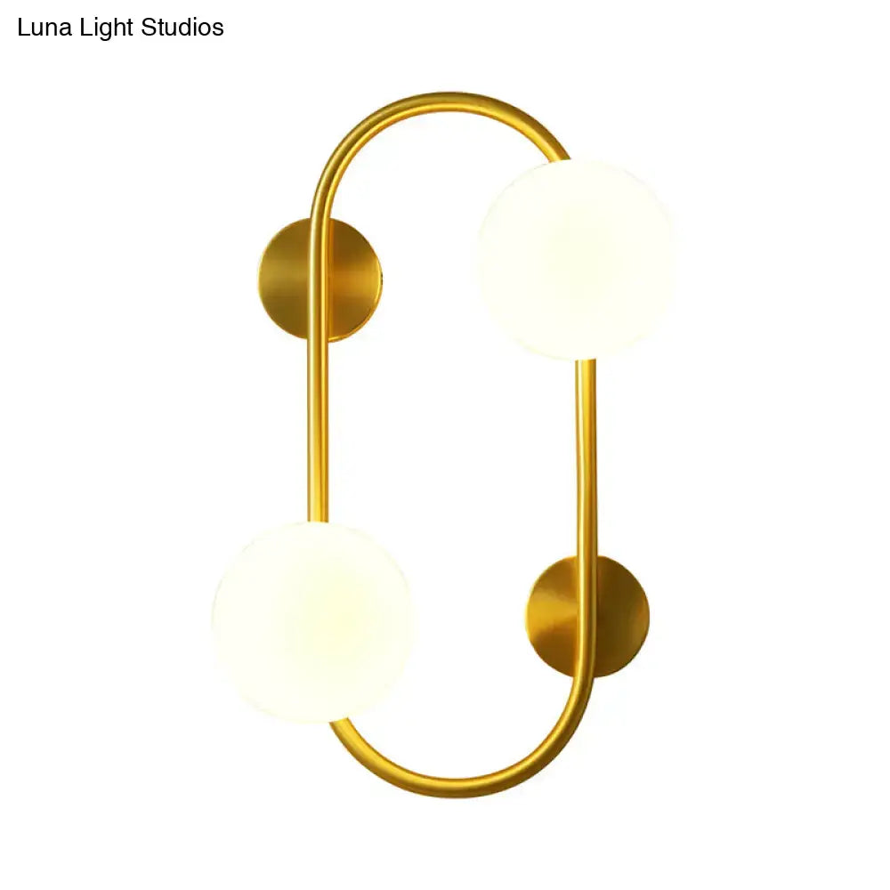 Milk Glass LED Sconce by Decorbites, gold brass wall light with two frosted globes on Tampa Home & Garden Store