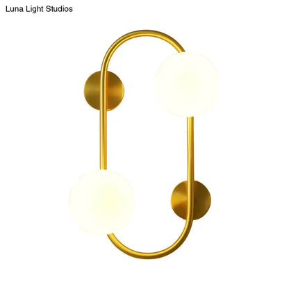 Milk Glass LED Sconce by Decorbites, gold brass wall light with two frosted globes on Tampa Home & Garden Store
