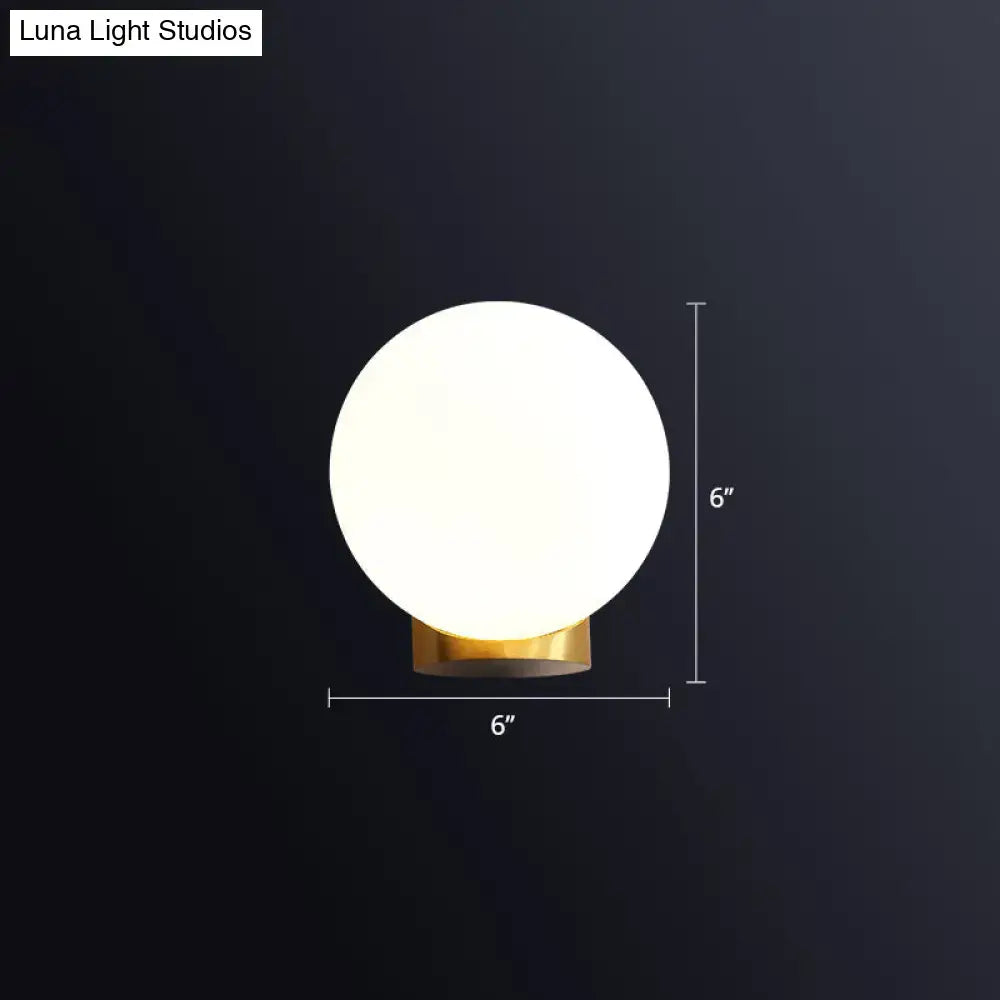 Brass Opal Wall Sconce with white opal globe and gold base Decorbites on Tampa Home & Garden Store