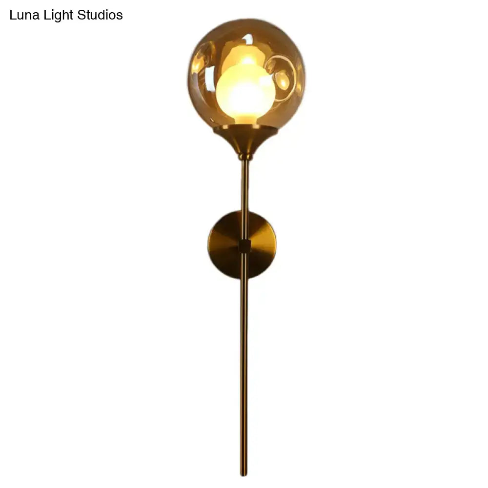 Brass Smoke Glass Wall Light by Decorbites, glass globe shade on brass wall mount on Tampa Home & Garden Store