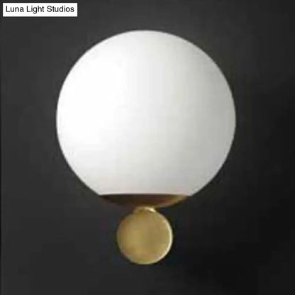 Brass Glass Sphere Sconce by Decorbites, white globe shade, wall-mount lighting on Tampa Home & Garden Store