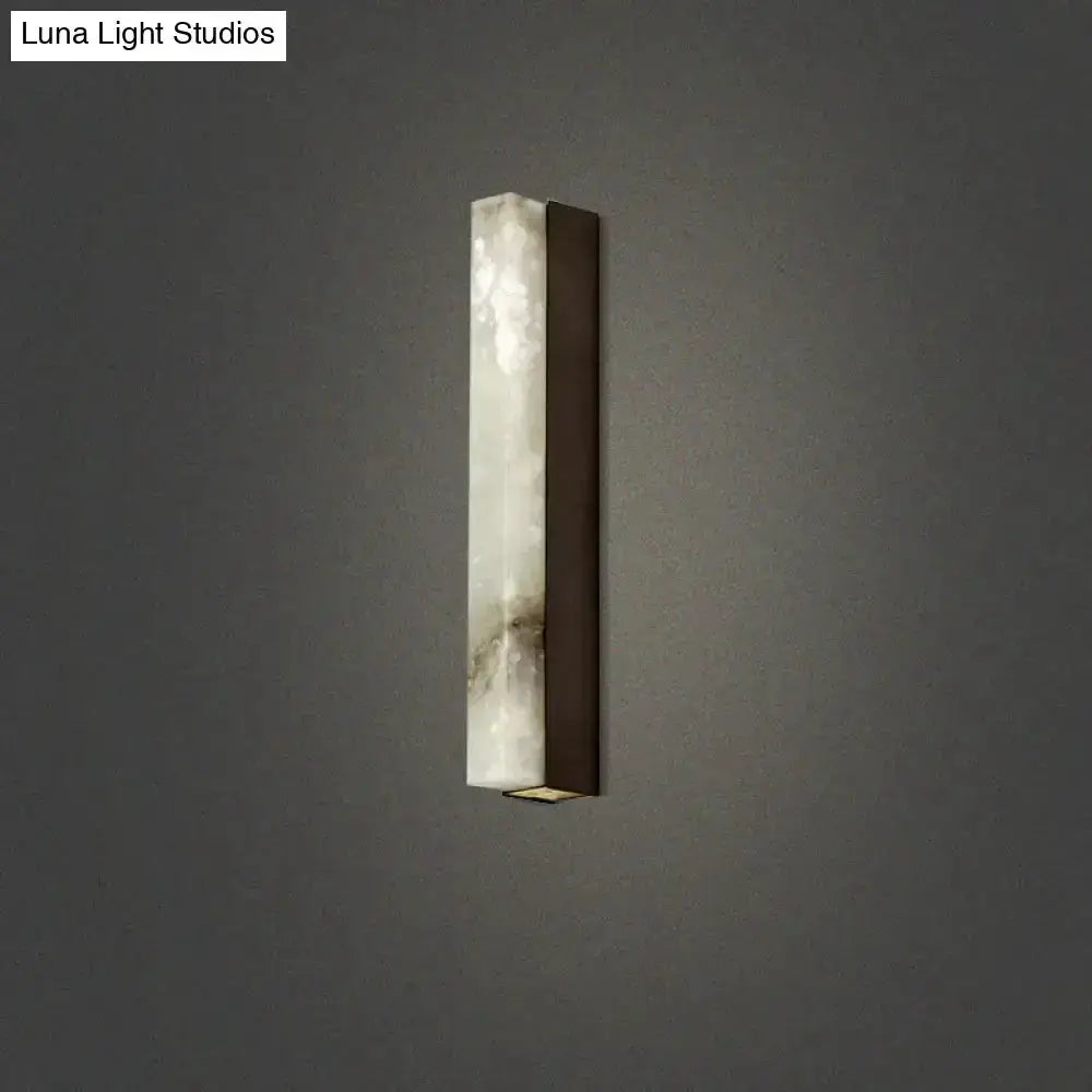 Brass and white onyx wall sconce for living room by Decorbites; Luna Light Studios on Tampa Home & Garden Store