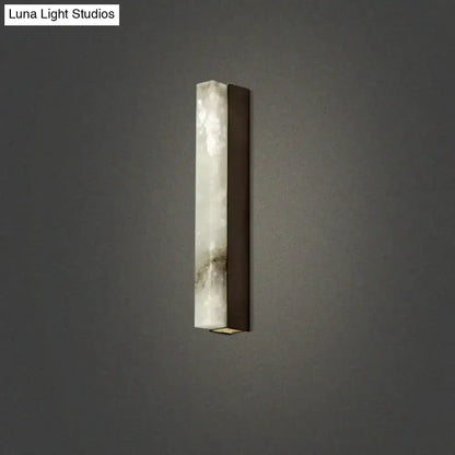 Brass and white onyx wall sconce for living room by Decorbites; Luna Light Studios on Tampa Home & Garden Store