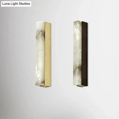 Pair of modern living room wall sconces in brass and bronze with white onyx panels by Decorbites on Tampa Home & Garden Store