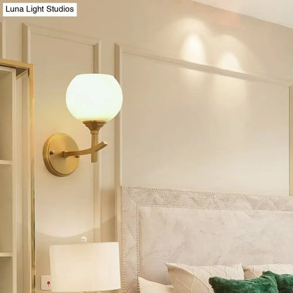 Brass Wall Sconce Dual Mount with round opal globe on Tampa Home & Garden Store