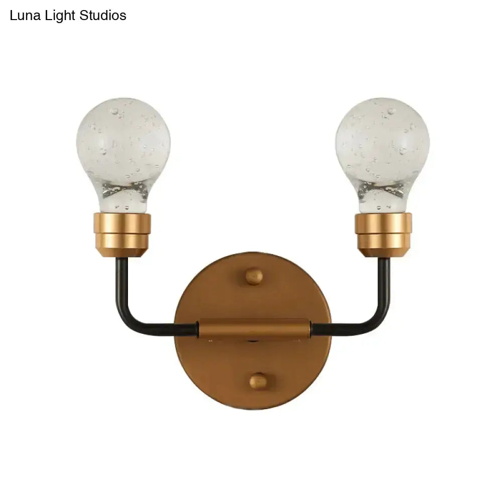 Modern brass and black dual bulb wall sconce by Decorbites with backplate and bubble bulbs on Tampa Home & Garden Store
