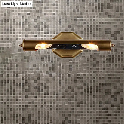 Brass glass wall sconce two-bulb vanity fixture on mosaic tile wall on Tampa Home & Garden Store