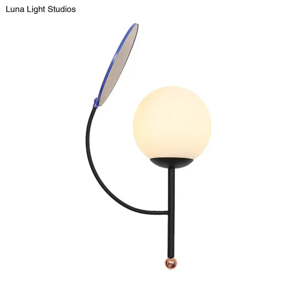 Brass Blue Frosted Sconce by Decorbites with curved black arm and frosted globe light copper tip on Tampa Home & Garden Store