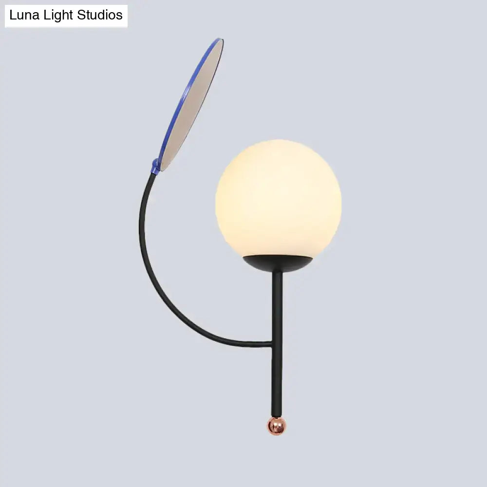 Brass Blue Frosted Sconce wall light with black curved arm, frosted globe and copper finial on Tampa Home & Garden Store