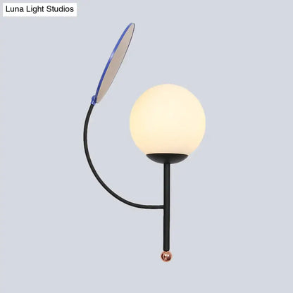 Brass Blue Frosted Sconce wall light with black curved arm, frosted globe and copper finial on Tampa Home & Garden Store