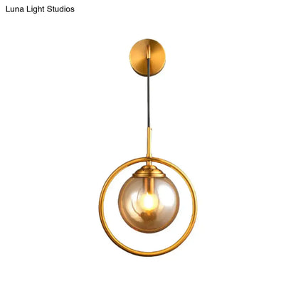 Brass Circular Wall Lamp by Decorbites with glass globe and gold ring pendant on Tampa Home & Garden Store