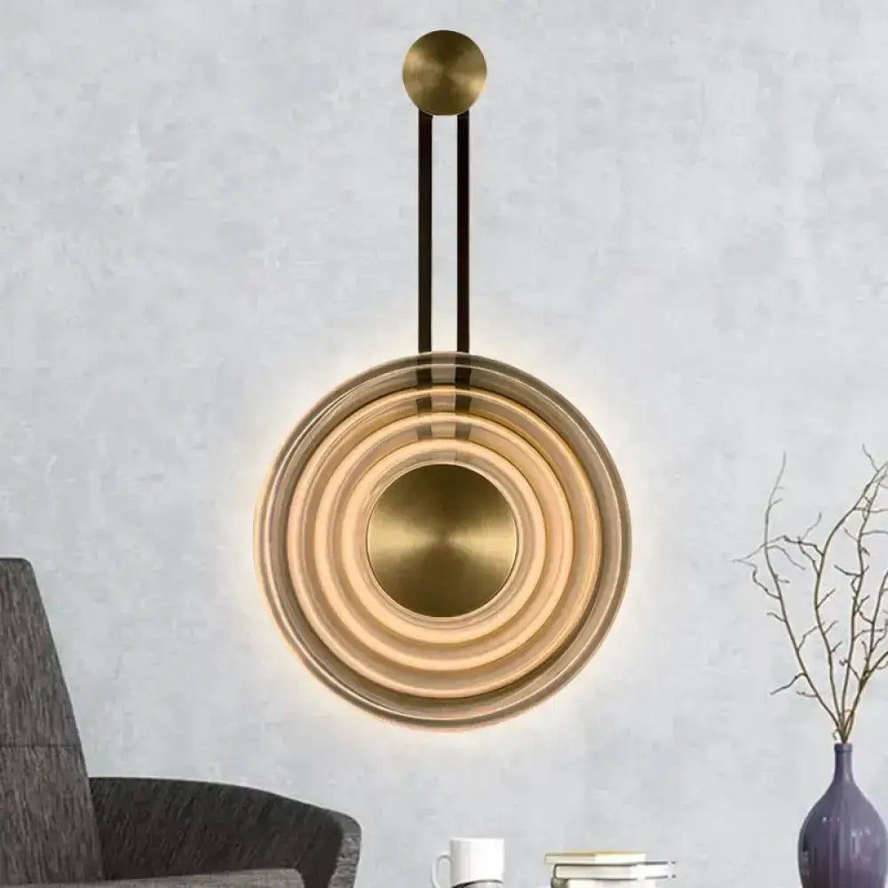 Modern brass concentric circle wall lamp by Decorbites, LED ring living room fixture on Tampa Home & Garden Store