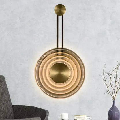 Modern brass concentric circle wall lamp by Decorbites, LED ring living room fixture on Tampa Home & Garden Store