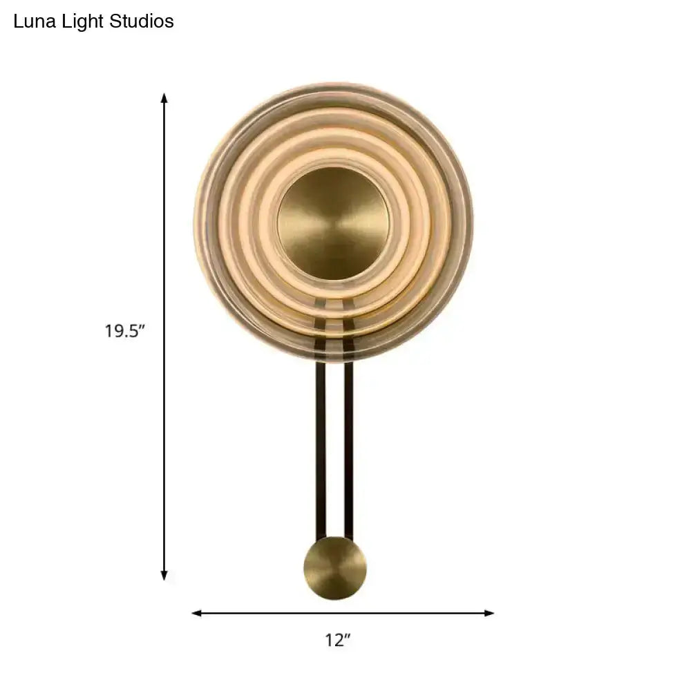 Modern brass concentric circle wall lamp by Decorbites, 19.5 in tall, 12 in wide on Tampa Home & Garden Store