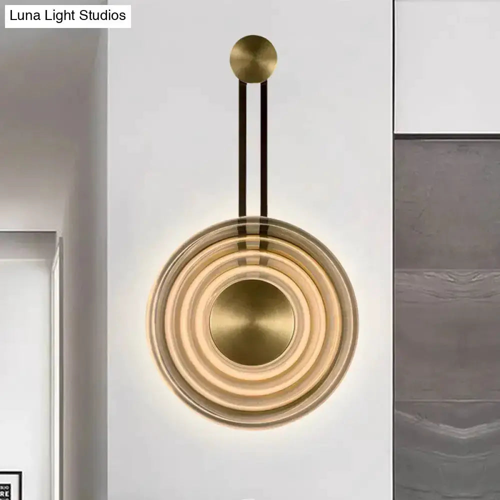 Concentric circle brass wall lamp by Decorbites, modern living room fixture with gold rings on Tampa Home & Garden Store