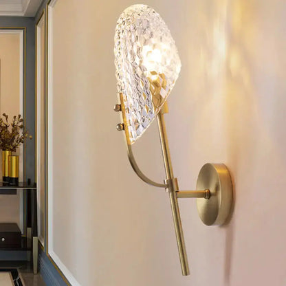Modern brass crystal beveled hallway sconce with curved arm by Decorbites on Tampa Home & Garden Store