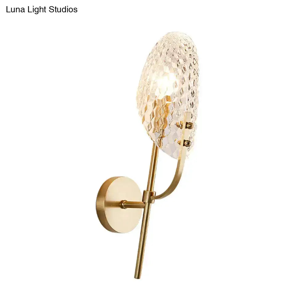 Modern brass crystal hallway sconce with faceted shade and curved arm by Decorbites on Tampa Home & Garden Store