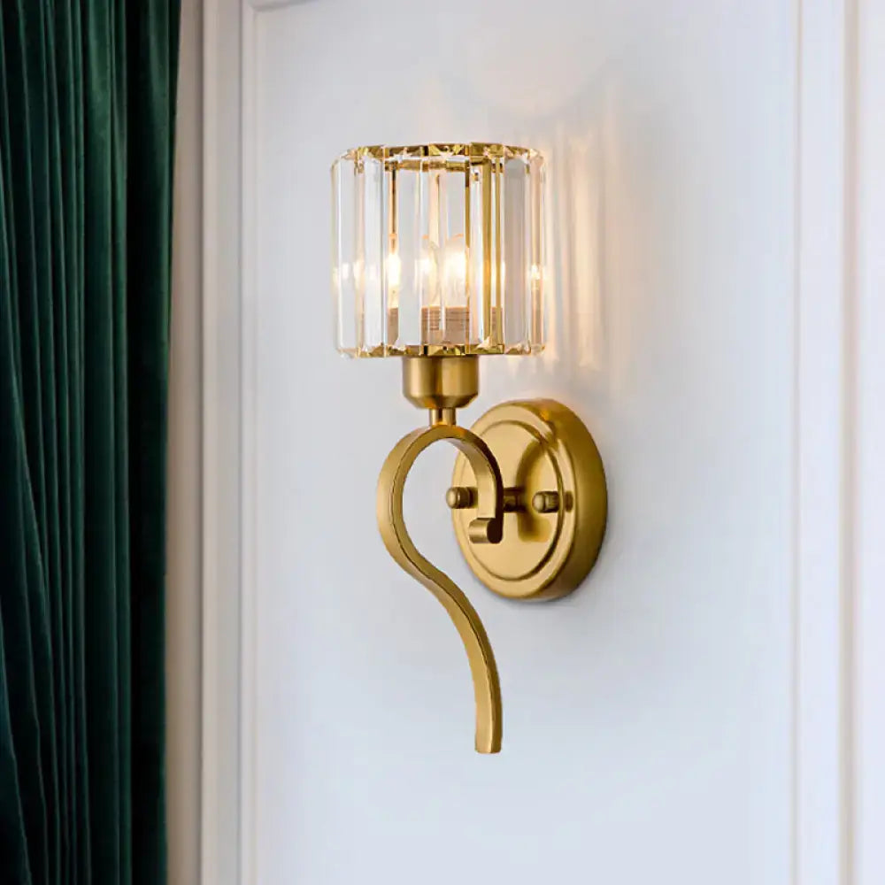 Crystal Cylinder Wall Sconce by Decorbites; gold brass curved arm with a clear crystal shade on Tampa Home & Garden Store