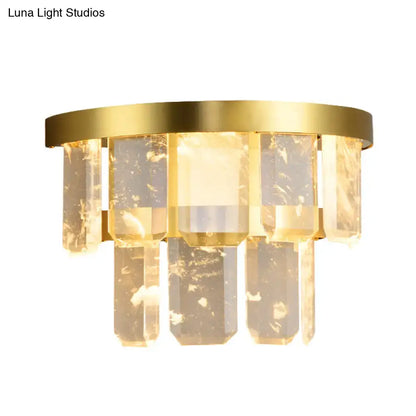 Brass crystal wall sconce with hanging rectangular prisms, warm glow by Decorbites on Tampa Home & Garden Store
